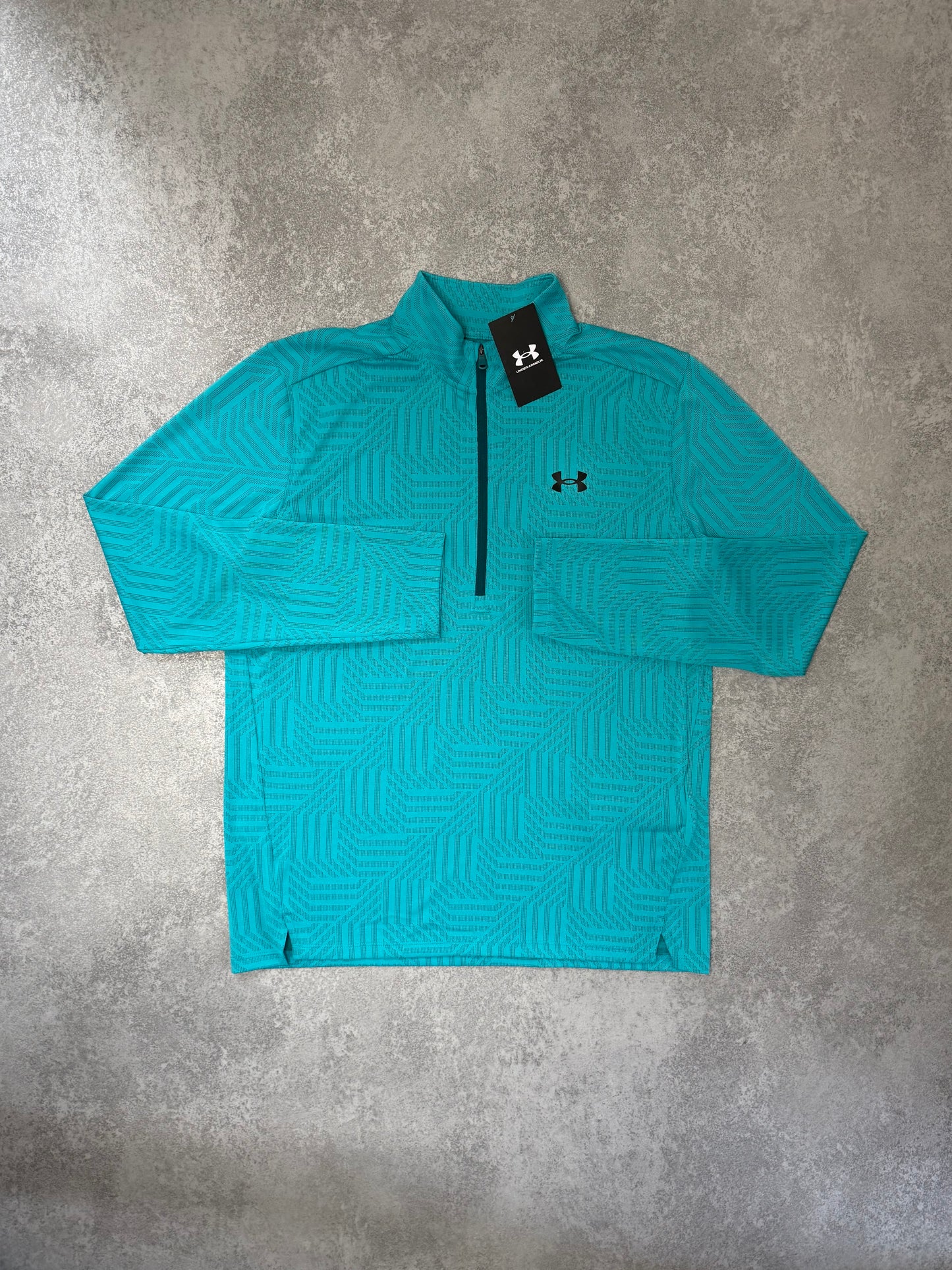 UA CYAN PATTERN HALF ZIP TOP