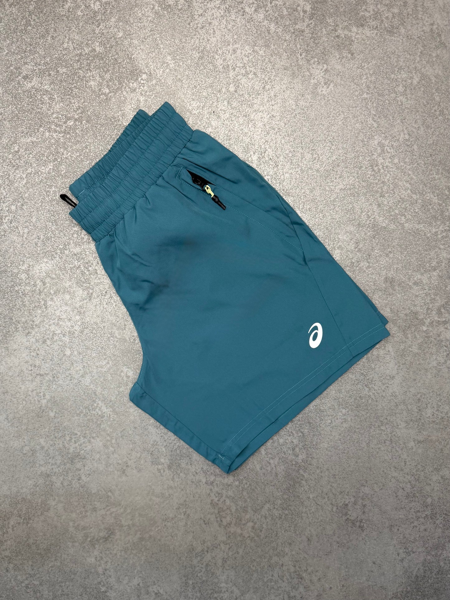 ASICS TEAL BACK POCKET SHORTS